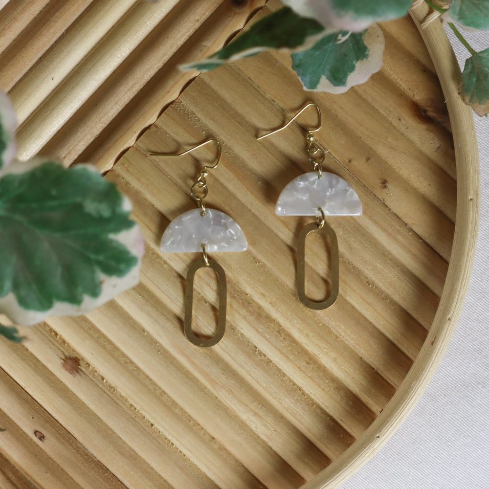 White and gold oval dangles